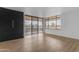 Spacious room with a large window and sliding glass door leading to a balcony at 4200 N Miller Rd # 325, Scottsdale, AZ 85251