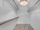 A well-lit walk-in closet, with lots of hanging space for clothing and storage at 4200 N Miller Rd # 325, Scottsdale, AZ 85251