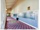 Beautiful hallway with mailbox and elevator access provides an inviting welcome to the community at 4200 N Miller Rd # 325, Scottsdale, AZ 85251
