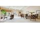 Open living room featuring a mix of seating arrangements and large windows offering bright, natural light at 4200 N Miller Rd # 325, Scottsdale, AZ 85251