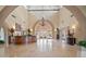 Elegant lobby featuring high ceilings, a grand chandelier, and a reception area, exuding sophistication at 4200 N Miller Rd # 325, Scottsdale, AZ 85251