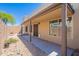 A covered back patio with neutral tones creates a relaxing, private outdoor space at 440 S Val Vista Dr # 11, Mesa, AZ 85204