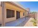 This private back patio with a stone path provides a relaxing outdoor space at 440 S Val Vista Dr # 11, Mesa, AZ 85204