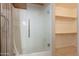 Bathroom showcasing a shower with glass door and a walk-in closet at 440 S Val Vista Dr # 11, Mesa, AZ 85204