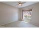 Bright bedroom with carpet and a window allowing for natural light at 440 S Val Vista Dr # 11, Mesa, AZ 85204