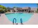 A beautiful community pool area featuring inviting blue water and ample lounging space at 440 S Val Vista Dr # 11, Mesa, AZ 85204