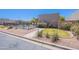 View of the fenced community pool with lounge chairs and manicured landscaping at 440 S Val Vista Dr # 11, Mesa, AZ 85204