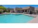 A luxurious community pool with lounge seating, providing a perfect spot to relax and unwind at 440 S Val Vista Dr # 11, Mesa, AZ 85204