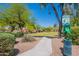 Well-maintained community dog park with green spaces and convenient waste disposal station at 440 S Val Vista Dr # 11, Mesa, AZ 85204