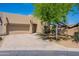 Charming single-Gathering home with desert landscaping, a two-car garage, and a cozy front entrance at 440 S Val Vista Dr # 11, Mesa, AZ 85204