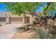 Single-Gathering home featuring desert landscaping, two-car garage, and cozy entrance with well-maintained surroundings at 440 S Val Vista Dr # 11, Mesa, AZ 85204