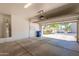 Two-car garage with a water heater and access to the outdoors at 440 S Val Vista Dr # 11, Mesa, AZ 85204