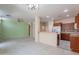Bright and airy living area featuring an open-concept layout, tile flooring, and a seamless transition to the kitchen at 440 S Val Vista Dr # 11, Mesa, AZ 85204
