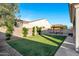 This spacious backyard features a patio and outdoor seating area for relaxing and entertaining at 4543 S Nebula --, Mesa, AZ 85212