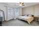Relaxing bedroom featuring soft neutral colors, bright natural light and an overhead ceiling fan at 4543 S Nebula --, Mesa, AZ 85212