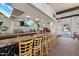 Upscale bar area with plenty of seating, TVs, and multiple drink options for entertaining guests at 4800 N 68Th St # 357, Scottsdale, AZ 85251