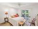 Cozy bedroom with patio access and wood-look floors at 4800 N 68Th St # 357, Scottsdale, AZ 85251