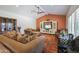 Stylish living room with neutral tones, comfortable seating, and a vaulted ceiling with a fan at 4800 N 68Th St # 357, Scottsdale, AZ 85251