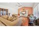 Comfortable living room with stylish furnishings, a vaulted ceiling, and a painted accent wall at 4800 N 68Th St # 357, Scottsdale, AZ 85251