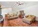 Spacious living room featuring hardwood floors, comfortable seating, and ample natural light at 4800 N 68Th St # 357, Scottsdale, AZ 85251