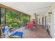 Spacious covered patio with comfortable seating and a view of the landscaped yard at 4800 N 68Th St # 357, Scottsdale, AZ 85251