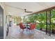 Covered patio with dining area, fan, and view of landscaped backyard at 4800 N 68Th St # 357, Scottsdale, AZ 85251
