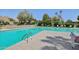 Refreshing community pool perfect for swimming laps or lounging in the sun with mature landscaping at 4800 N 68Th St # 357, Scottsdale, AZ 85251