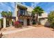 Charming two-story home with a balcony, small yard and desert landscaping at 4818 E Hazel Dr # 1, Phoenix, AZ 85044
