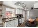 Bright kitchen with stainless appliances, granite countertops, and ample cabinet space at 4818 E Hazel Dr # 1, Phoenix, AZ 85044