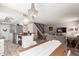 Open concept living space features modern kitchen and dining area, perfect for entertaining at 4818 E Hazel Dr # 1, Phoenix, AZ 85044