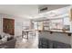 Stylish space with dining table, breakfast bar and view to the outdoor patio at 4818 E Hazel Dr # 1, Phoenix, AZ 85044