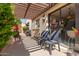 Inviting covered patio with comfortable seating, perfect for outdoor relaxation at 4818 E Hazel Dr # 1, Phoenix, AZ 85044