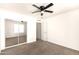 The bright bedroom features a mirrored closet at 4925 S 5Th Ave, Phoenix, AZ 85041