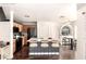 Well-lit kitchen featuring a large island with seating and modern appliances, blending style and functionality for enjoyable cooking at 4925 S 5Th Ave, Phoenix, AZ 85041