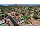 Stunning property featuring a backyard pool and ample outdoor space, set against a mountain backdrop at 5112 E Cholla St, Scottsdale, AZ 85254