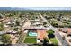 Bird's eye view showing pool, grounds, and surrounding neighborhood at 5112 E Cholla St, Scottsdale, AZ 85254