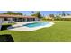 Large private pool and artificial lawn backyard, perfect for outdoor enjoyment and relaxation at 5112 E Cholla St, Scottsdale, AZ 85254