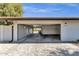 Attached, multi-car garage featuring automatic doors and custom lighting at 5112 E Cholla St, Scottsdale, AZ 85254