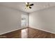 Bedroom featuring hardwood floors, a ceiling fan, and a window at 5827 E Larkspur Dr, Scottsdale, AZ 85254