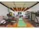 Spacious garage converted to a home gym with exercise equipment at 5827 E Larkspur Dr, Scottsdale, AZ 85254