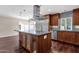 Modern kitchen island with stainless steel appliances and plenty of counter space for cooking and preparing food at 5827 E Larkspur Dr, Scottsdale, AZ 85254
