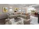 Cozy living room with neutral furniture, accent pillows, and an open layout for comfortable living and entertaining at 5827 E Larkspur Dr, Scottsdale, AZ 85254