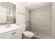 Updated bathroom with shower and sink, featuring updated tiles and fixtures at 6139 N 31St Dr, Phoenix, AZ 85017