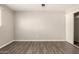 Open, airy bedroom featuring wood flooring and a sliding door closet at 6139 N 31St Dr, Phoenix, AZ 85017