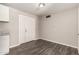 Cozy dining area with modern flooring, freshly painted neutral walls, and a convenient access door at 6139 N 31St Dr, Phoenix, AZ 85017