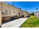 The backyard includes a seating area, a barbecue and solar panels, offering a relaxing and eco-friendly outdoor space at 630 E Jensen St # 154, Mesa, AZ 85203