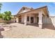 A house with a covered patio, brick-laid patio floor, rock landscaping, and outdoor access at 6837 S Roosevelt St, Tempe, AZ 85283