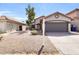 Charming home exterior with a well-manicured lawn, desert landscaping, and a two-car garage at 6837 S Roosevelt St, Tempe, AZ 85283