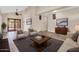 Open-concept living room featuring modern decor and seamless floor plan at 6837 S Roosevelt St, Tempe, AZ 85283