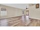 Living room showcasing updated flooring and lots of natural light at 6837 S Roosevelt St, Tempe, AZ 85283